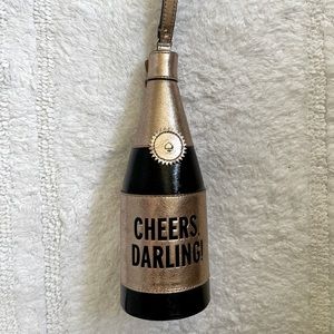 KATE SPADE NEW YORK “CHEERS, DARLING!” CHAMPAGNE BOTTLE WRISTLET PURSE